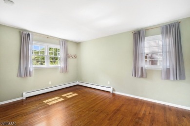 Lakeside living at its finest! Enjoy easy, one-level living in on Lake Lackawanna Golf Course in New Jersey - for sale on GolfHomes.com, golf home, golf lot