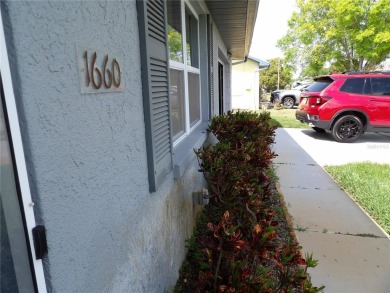 What a GEM of a house....Great Curb Appeal.....  Just a Hop on Highland Lakes Executive Golf Course in Florida - for sale on GolfHomes.com, golf home, golf lot