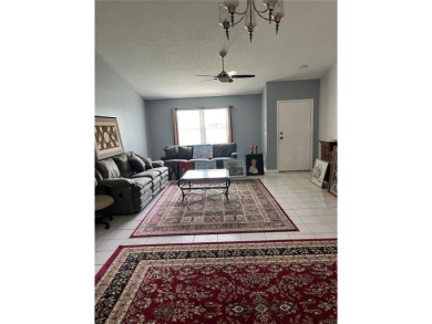What a GEM of a house....Great Curb Appeal.....  Just a Hop on Highland Lakes Executive Golf Course in Florida - for sale on GolfHomes.com, golf home, golf lot