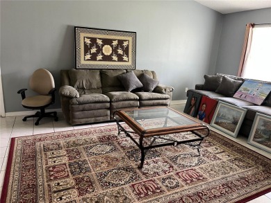 What a GEM of a house....Great Curb Appeal.....  Just a Hop on Highland Lakes Executive Golf Course in Florida - for sale on GolfHomes.com, golf home, golf lot