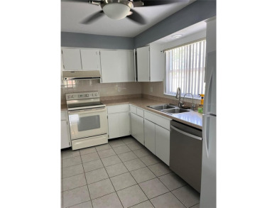 What a GEM of a house....Great Curb Appeal.....  Just a Hop on Highland Lakes Executive Golf Course in Florida - for sale on GolfHomes.com, golf home, golf lot