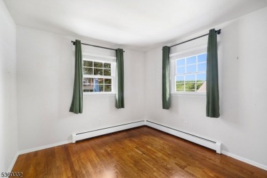 Lakeside living at its finest! Enjoy easy, one-level living in on Lake Lackawanna Golf Course in New Jersey - for sale on GolfHomes.com, golf home, golf lot
