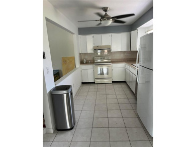 What a GEM of a house....Great Curb Appeal.....  Just a Hop on Highland Lakes Executive Golf Course in Florida - for sale on GolfHomes.com, golf home, golf lot