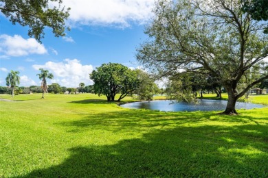 Welcome to this beautifully maintained first-floor 1-bedroom on Flamingo Lakes Country Club in Florida - for sale on GolfHomes.com, golf home, golf lot
