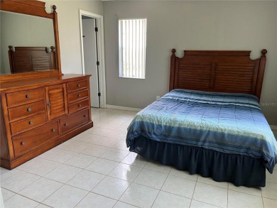 What a GEM of a house....Great Curb Appeal.....  Just a Hop on Highland Lakes Executive Golf Course in Florida - for sale on GolfHomes.com, golf home, golf lot