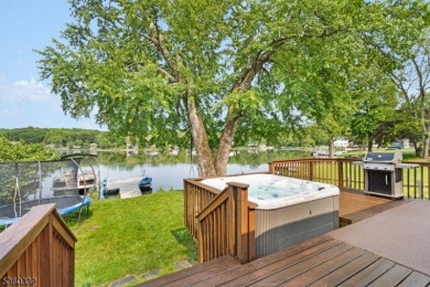 Lakeside living at its finest! Enjoy easy, one-level living in on Lake Lackawanna Golf Course in New Jersey - for sale on GolfHomes.com, golf home, golf lot