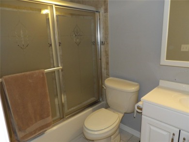 What a GEM of a house....Great Curb Appeal.....  Just a Hop on Highland Lakes Executive Golf Course in Florida - for sale on GolfHomes.com, golf home, golf lot