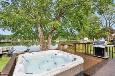 Lakeside living at its finest! Enjoy easy, one-level living in on Lake Lackawanna Golf Course in New Jersey - for sale on GolfHomes.com, golf home, golf lot