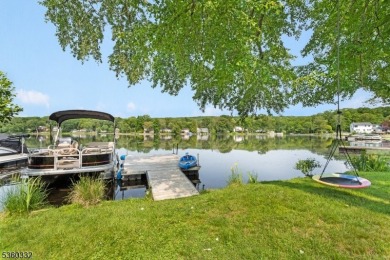 Lakeside living at its finest! Enjoy easy, one-level living in on Lake Lackawanna Golf Course in New Jersey - for sale on GolfHomes.com, golf home, golf lot