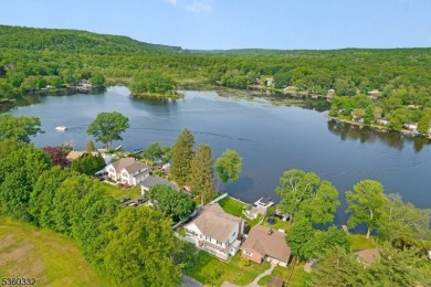 Lakeside living at its finest! Enjoy easy, one-level living in on Lake Lackawanna Golf Course in New Jersey - for sale on GolfHomes.com, golf home, golf lot