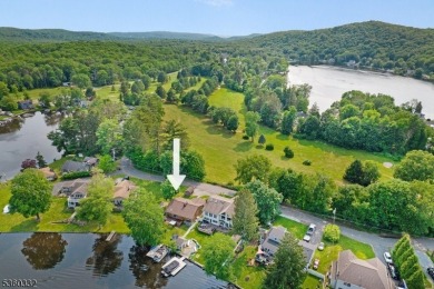 Lakeside living at its finest! Enjoy easy, one-level living in on Lake Lackawanna Golf Course in New Jersey - for sale on GolfHomes.com, golf home, golf lot