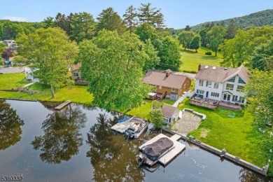 Lakeside living at its finest! Enjoy easy, one-level living in on Lake Lackawanna Golf Course in New Jersey - for sale on GolfHomes.com, golf home, golf lot