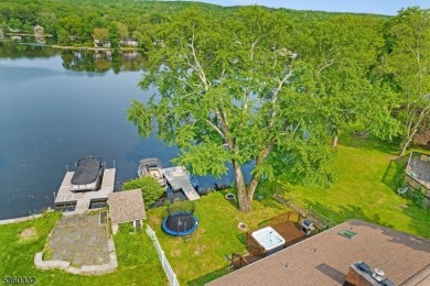 Lakeside living at its finest! Enjoy easy, one-level living in on Lake Lackawanna Golf Course in New Jersey - for sale on GolfHomes.com, golf home, golf lot