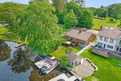 Lakeside living at its finest! Enjoy easy, one-level living in on Lake Lackawanna Golf Course in New Jersey - for sale on GolfHomes.com, golf home, golf lot