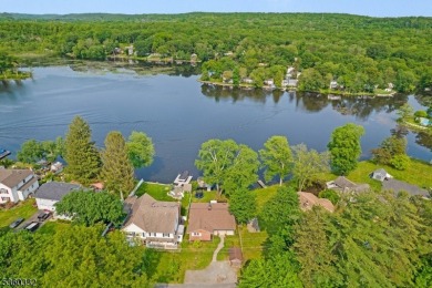 Lakeside living at its finest! Enjoy easy, one-level living in on Lake Lackawanna Golf Course in New Jersey - for sale on GolfHomes.com, golf home, golf lot