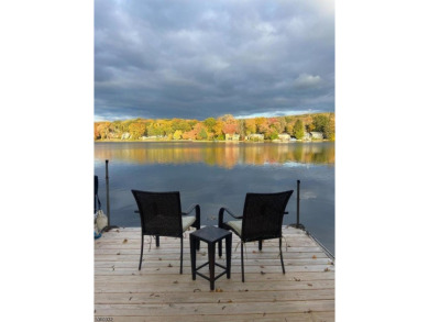 Lakeside living at its finest! Enjoy easy, one-level living in on Lake Lackawanna Golf Course in New Jersey - for sale on GolfHomes.com, golf home, golf lot