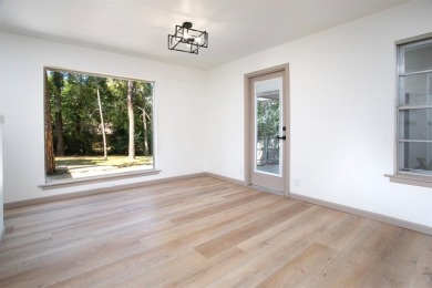 Adorable home in Hideaway Lake is waiting for you! 3 bedroom, 2 on Hide-A-Way Lake Golf Course in Texas - for sale on GolfHomes.com, golf home, golf lot
