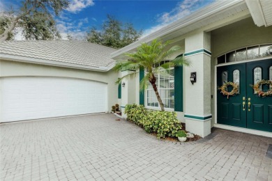 Elegant Florida Living in a Private Gated Golf Community on Plantation Golf and Country Club in Florida - for sale on GolfHomes.com, golf home, golf lot
