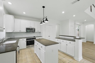 Beautifully updated and move-in ready, this 4-bedroom, 3-bath on Stewart Peninsula Golf Course in Texas - for sale on GolfHomes.com, golf home, golf lot