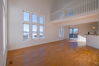 This spacious 2-story home offers 2,354 sq ft with 5 bedrooms, 3 on Desert Hawk At Pueblo West in Colorado - for sale on GolfHomes.com, golf home, golf lot