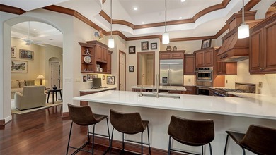 Expertly designed by the highly regarded John Cannon Homes on Longboat Key Golf Club Resort in Florida - for sale on GolfHomes.com, golf home, golf lot