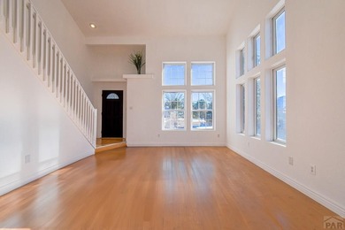 This spacious 2-story home offers 2,354 sq ft with 5 bedrooms, 3 on Desert Hawk At Pueblo West in Colorado - for sale on GolfHomes.com, golf home, golf lot