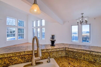 This spacious 2-story home offers 2,354 sq ft with 5 bedrooms, 3 on Desert Hawk At Pueblo West in Colorado - for sale on GolfHomes.com, golf home, golf lot