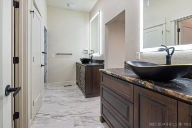 The stunning new construction in the highly sought after *Porto on The Club At Porto Cima in Missouri - for sale on GolfHomes.com, golf home, golf lot