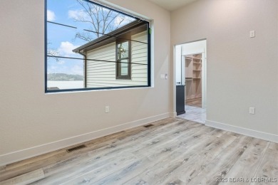 The stunning new construction in the highly sought after *Porto on The Club At Porto Cima in Missouri - for sale on GolfHomes.com, golf home, golf lot
