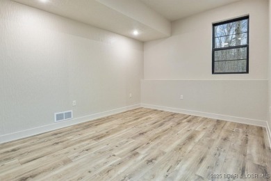 The stunning new construction in the highly sought after *Porto on The Club At Porto Cima in Missouri - for sale on GolfHomes.com, golf home, golf lot