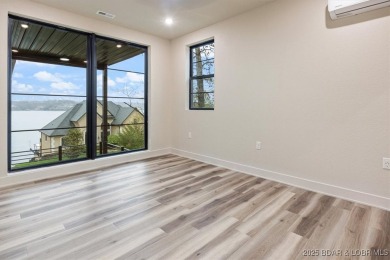 The stunning new construction in the highly sought after *Porto on The Club At Porto Cima in Missouri - for sale on GolfHomes.com, golf home, golf lot
