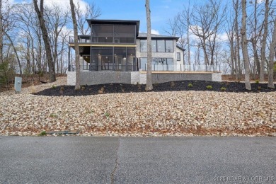 The stunning new construction in the highly sought after *Porto on The Club At Porto Cima in Missouri - for sale on GolfHomes.com, golf home, golf lot