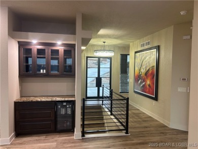 The stunning new construction in the highly sought after *Porto on The Club At Porto Cima in Missouri - for sale on GolfHomes.com, golf home, golf lot
