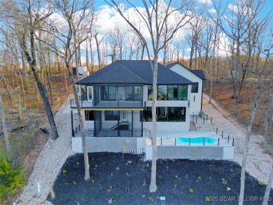 The stunning new construction in the highly sought after *Porto on The Club At Porto Cima in Missouri - for sale on GolfHomes.com, golf home, golf lot