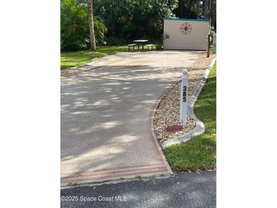 Enjoy resort-style living with this beautifully maintained RV on The Great Outdoors Golf and Country Club in Florida - for sale on GolfHomes.com, golf home, golf lot