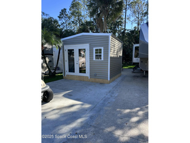 Enjoy resort-style living with this beautifully maintained RV on The Great Outdoors Golf and Country Club in Florida - for sale on GolfHomes.com, golf home, golf lot