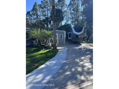 Enjoy resort-style living with this beautifully maintained RV on The Great Outdoors Golf and Country Club in Florida - for sale on GolfHomes.com, golf home, golf lot