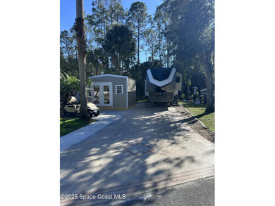 Enjoy resort-style living with this beautifully maintained RV on The Great Outdoors Golf and Country Club in Florida - for sale on GolfHomes.com, golf home, golf lot