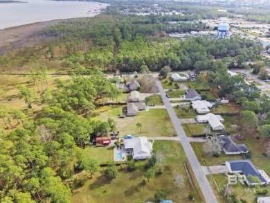 Build your dream home on this large lot located in the heart of on Orange Beach Golf Center in Alabama - for sale on GolfHomes.com, golf home, golf lot