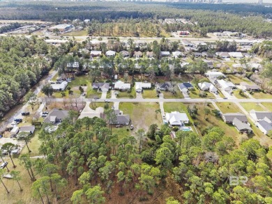 Build your dream home on this large lot located in the heart of on Orange Beach Golf Center in Alabama - for sale on GolfHomes.com, golf home, golf lot