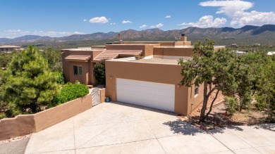 Stunning modern pueblo style home with surrounding mountain on Paa-Ko Ridge Golf Club  in New Mexico - for sale on GolfHomes.com, golf home, golf lot