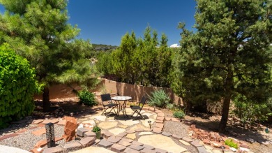 Stunning modern pueblo style home with surrounding mountain on Paa-Ko Ridge Golf Club  in New Mexico - for sale on GolfHomes.com, golf home, golf lot