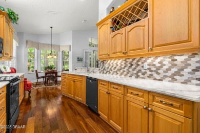 This Beautiful Home Offers Space, Architectural Features on Halifax Plantation Golf Club in Florida - for sale on GolfHomes.com, golf home, golf lot