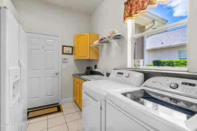 This Beautiful Home Offers Space, Architectural Features on Halifax Plantation Golf Club in Florida - for sale on GolfHomes.com, golf home, golf lot