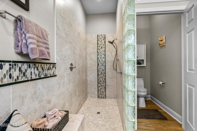 This Beautiful Home Offers Space, Architectural Features on Halifax Plantation Golf Club in Florida - for sale on GolfHomes.com, golf home, golf lot
