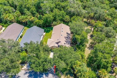 This Beautiful Home Offers Space, Architectural Features on Halifax Plantation Golf Club in Florida - for sale on GolfHomes.com, golf home, golf lot