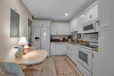 Enjoy your morning coffee and breakfast on your lanai while on University Park Country Club in Florida - for sale on GolfHomes.com, golf home, golf lot