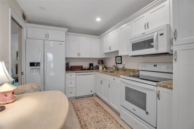 Enjoy your morning coffee and breakfast on your lanai while on University Park Country Club in Florida - for sale on GolfHomes.com, golf home, golf lot