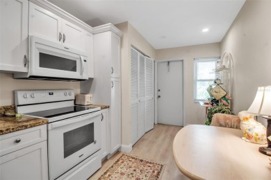 Enjoy your morning coffee and breakfast on your lanai while on University Park Country Club in Florida - for sale on GolfHomes.com, golf home, golf lot