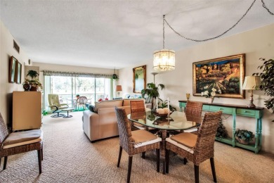 Enjoy your morning coffee and breakfast on your lanai while on University Park Country Club in Florida - for sale on GolfHomes.com, golf home, golf lot